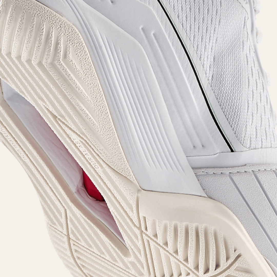 Wilson Rush Pro 4.5 all court women's tennis shoes white / surf spray / tofu